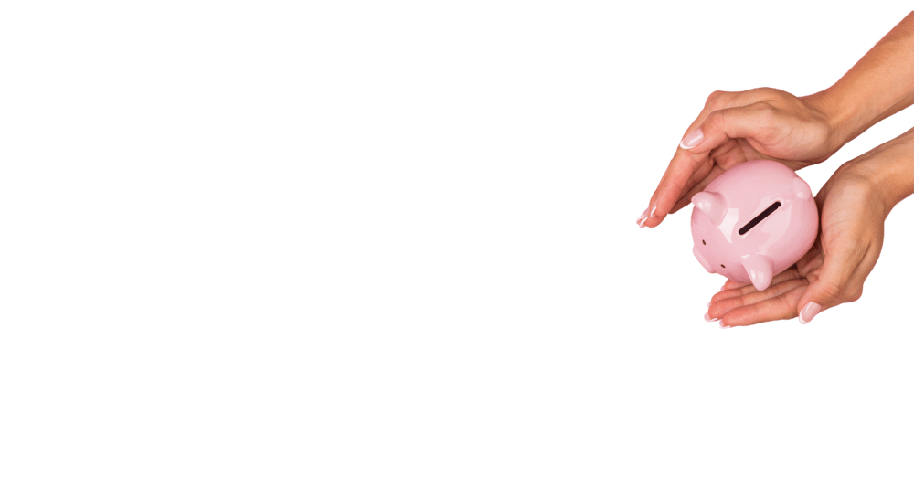 Piggy bank held in a woman's hands