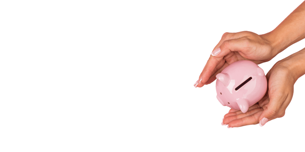 Piggy bank held in a woman's hands